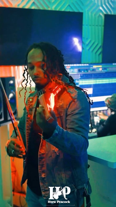 Heru The Violinist performing in studio – Holiday Gift Picks